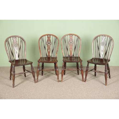 850 - A SET OF FOUR ELM AND ASH WHEELBACK CHAIRS

19th century, on turned legs joined by stretchers, 88cm ... 