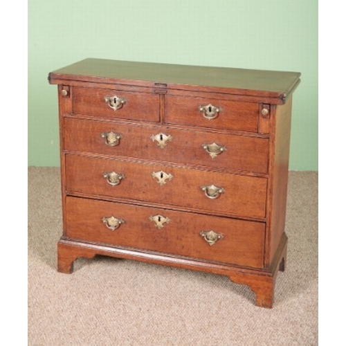 852 - A GEORGE III OAK BACHELOR'S CHEST

mid-18th century, with a hinged top above one short and three lon... 