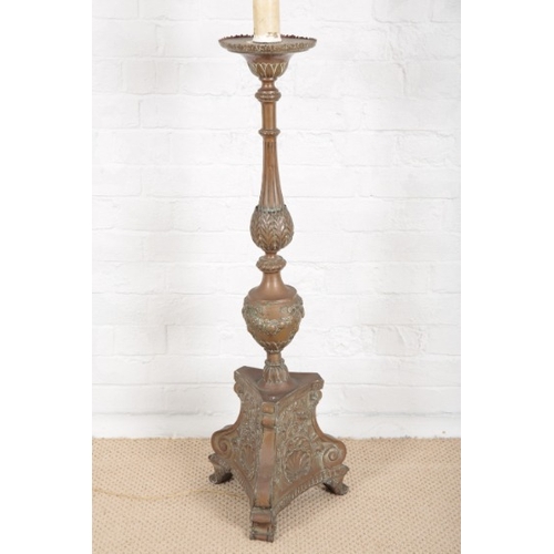 871 - A COPPER ELECTRIC STANDARD LAMP OF ITALIANATE BAROQUE STYLE

late 19th century, the plaster candle f... 