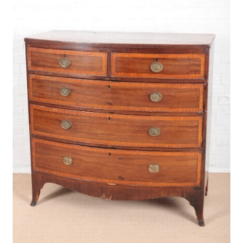 872 - A GEORGE IV MAHOGANY BOWFRONT CHEST OF DRAWERS

inlaid throughout with satinwood cross bandings, top... 