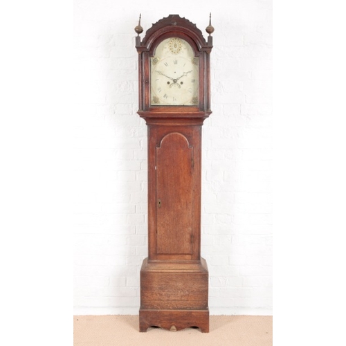 887 - AN OAK LONGCASE CLOCK

late 18th/early 19th century, the arched painted dial with Roman numerals, ca... 