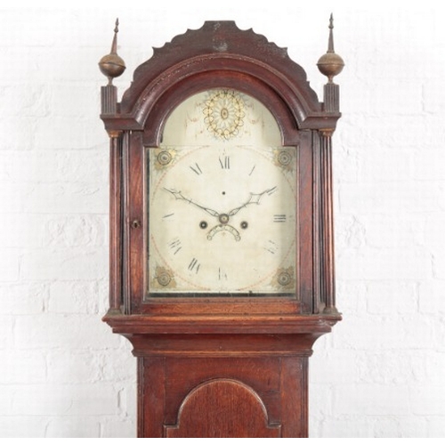 887 - AN OAK LONGCASE CLOCK

late 18th/early 19th century, the arched painted dial with Roman numerals, ca... 