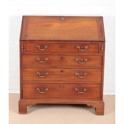 890 - A GEORGE III MAHOGANY BUREAU

the fall front enclosing a fitted interior of central cupboard, six sm... 