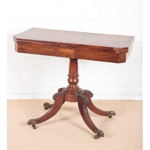 891 - A REGENCY FIGURED MAHOGANY CARD TABLE

the red baize lined and crossbanded top with canted front cor... 