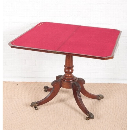 891 - A REGENCY FIGURED MAHOGANY CARD TABLE

the red baize lined and crossbanded top with canted front cor... 