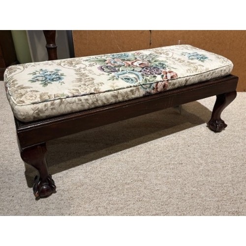 911 - A MAHOGANY LONG LOW STOOL WITH BALL AND CLAW FEET

early 20th century, with separate loose cushion, ... 