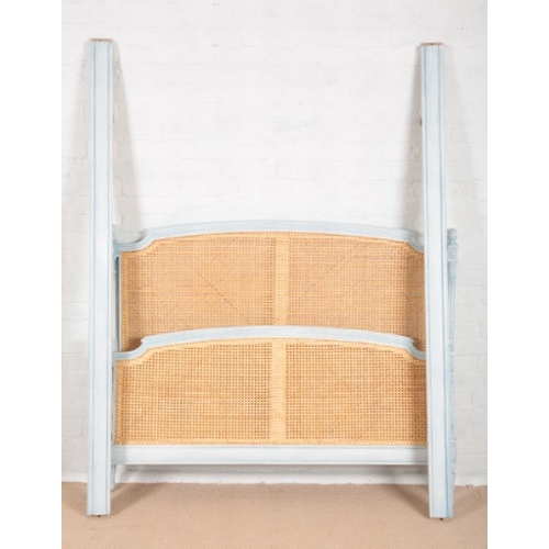 921 - A FRENCH LIGHT BLUE PAINTED DOUBLE BED

of 18th century style, the caned head and foot with floral f... 