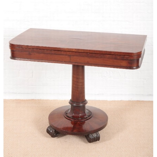 922 - A WILLIAM IV FIGURED MAHOGANY D-SHAPED CARD TABLE

with green baize-lined folding top, on turned col... 