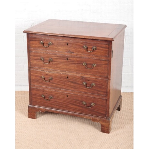 932 - A GEORGE III STYLE MAHOGANY CUPBOARD

the four simulated graduated drawers with brass swan-neck hand... 