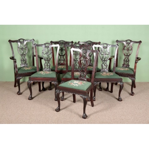 934 - A SET OF EIGHT GEORGE III CHIPPENDALE STYLE DINING CHAIRS

comprising two carvers and six dining cha... 