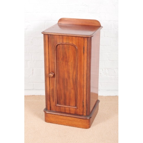 935 - A VICTORIAN MAHOGANY BEDSIDE CUPBOARD

with beaded decoration to the door, 76cm high x 41cm wide