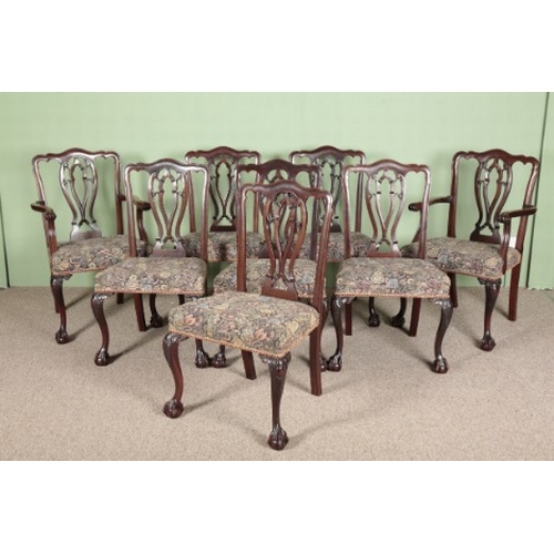 946 - A SET OF EIGHT GEORGE III CHIPPENDALE STYLE MAHOGANY DINING CHAIRS

comprising two carvers and six s... 