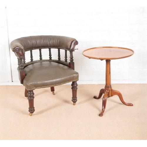 955 - A VICTORIAN MAHOGANY LIBRARY READING CHAIR

with upholstered leather back and seat, on turned fronte... 