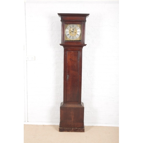 957 - AN OAK LONGCASE CLOCK BY THOMAS MARTIN OF LONDON

18th century, the 27cm square brass dial with silv... 