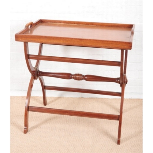 959 - A LATE VICTORIAN MAHOGANY BUTLER'S TRAY

the plain rectangular gallery with twin handle cut-outs, on... 