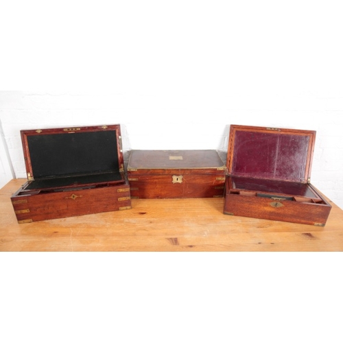 974 - A VICTORIAN BRASS BOUND MAHOGANY WRITING BOX

with Turner's Pattern triple bar lock, 17cm high x 50c... 