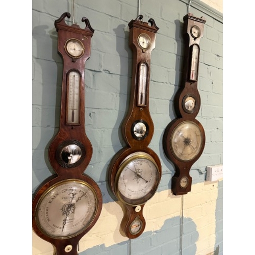 975 - FOUR VICTORIAN BAROMETERS

various makers, all fitted hydrometers, thermometers and barometers and c... 