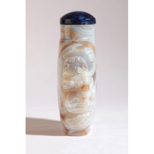 118 - A CHINESE 'MACARONI' AGATE SNUFF BOTTLE

18th/19th century, of flattened form with light blue inclus... 