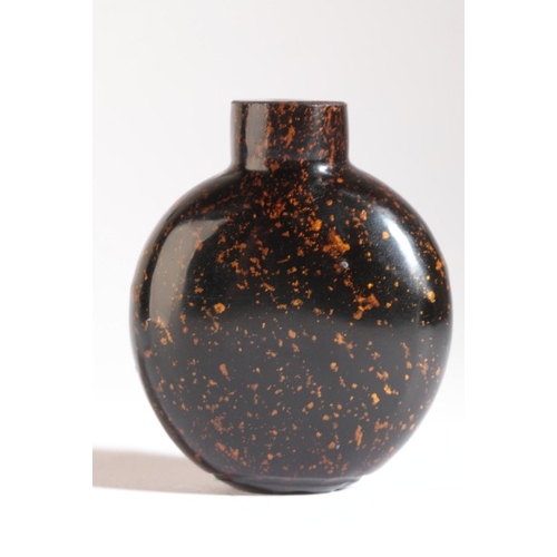 128 - A CHINESE BLACK AVENTURINE GLASS SNUFF BOTTLE

18th/19th century, of bulbous shape, 6cm high 

The D... 