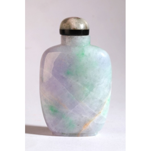 13 - A CHINESE JADEITE SNUFF BOTTLE

late 19th century, the apple green and lavender stone carved to one ... 