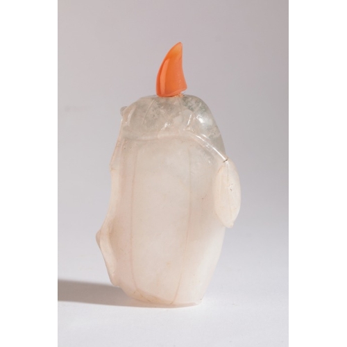 133 - A CHINESE CRYSTAL SNUFF BOTTLE

19th/20th century, in pebble form carved with a butterfly and flower... 