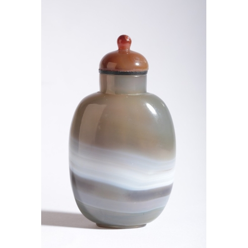 145 - A CHINESE AGATE SNUFF BOTTLE

likely 18th/19th century, with white continuous banding, 9cm high over... 