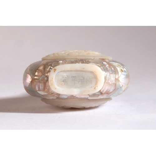 157 - A CHINESE MOTHER OF PEARL SNUFF BOTTLE

bearing a four character Tongzhi mark to the base, the front... 