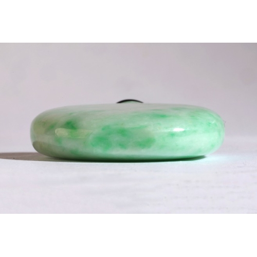 16 - A CHINESE JADEITE SNUFF BOTTLE

18th/19th century, of spade shape, 5cm high overall

The Dick Hardy ... 