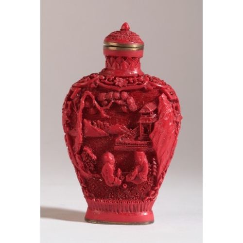 172 - A CHINESE CINNABAR STYLE SNUFF BOTTLE

bearing a four character Qianlong mark, with high shoulders a... 