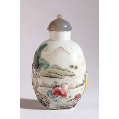 188 - A CHINESE PORCELAIN SNUFF BOTTLE

bearing a four character Qianlong mark to the base, the body with ... 