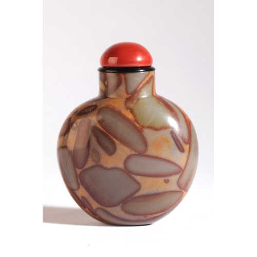 19 - A CHINESE 'PUDDINGSTONE' SNUFF BOTTLE

19th century, of bulbus form, 5cm high overall

The Dick Hard... 