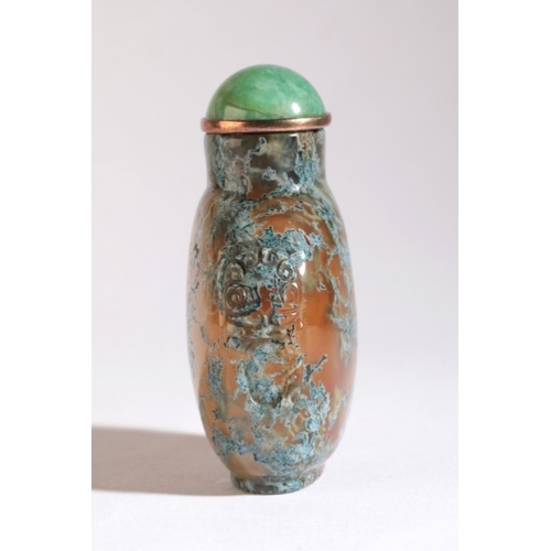 23 - A CHINESE AGATE SNUFF BOTTLE

18th/19th century, the brown agate with blue dendritic inclusions and ... 