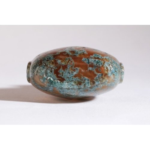 23 - A CHINESE AGATE SNUFF BOTTLE

18th/19th century, the brown agate with blue dendritic inclusions and ... 