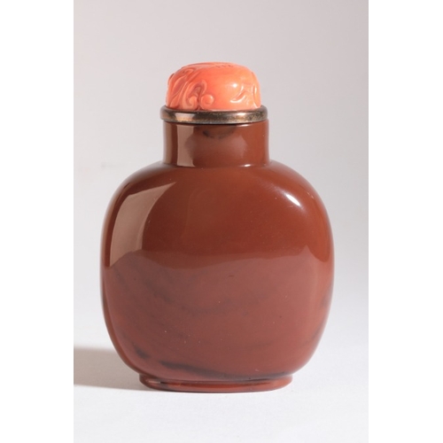 24 - A CHINESE JASPER SNUFF BOTTLE

early 19th century, the yellow ochre skin carved to one side with a h... 