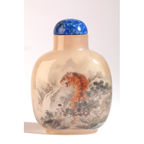 34 - A CHINESE AGATE INSIDE PAINTED SNUFF BOTTLE SIGNED BY WANG XISAN

dated 1978, the front decorated wi... 