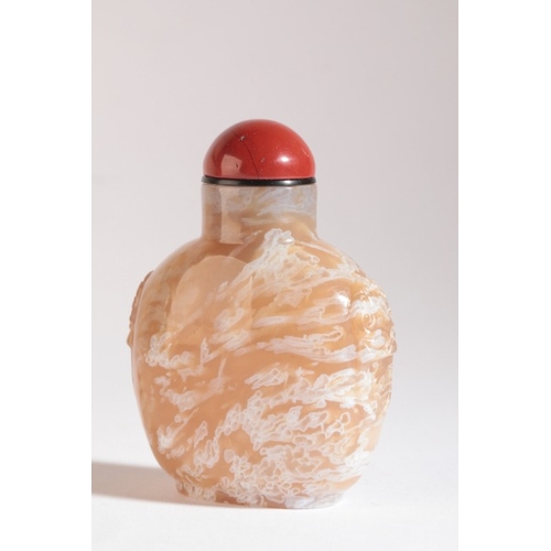 42 - A CHINESE 'MACARONI' AGATE SNUFF BOTTLE

18th/19th century, with carved mask and ring shoulders, 6cm... 