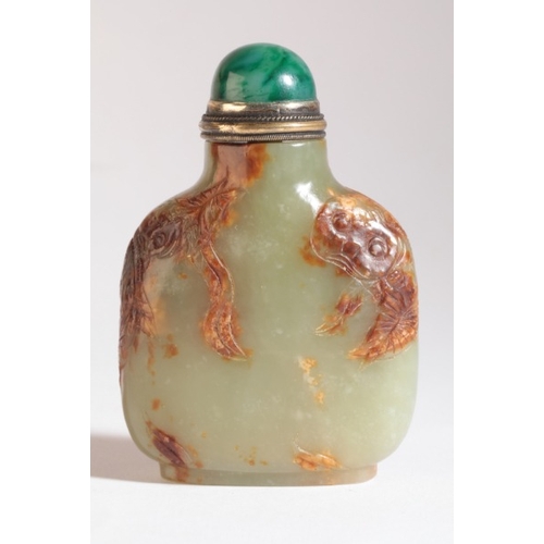 54 - A CHINESE JADE SNUFF BOTTLE

18th/19th century, the green nephrite with small white cloudy inclusion... 