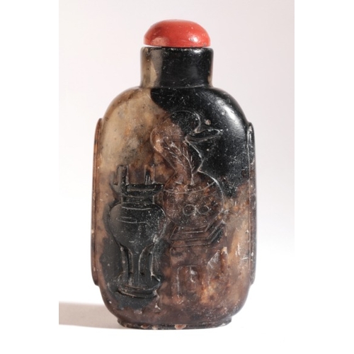 67 - A CHINESE SOAPSTONE SNUFF BOTTLE

19th century, one side carved with a stag in a rocky landscape, th... 