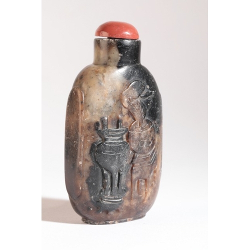 67 - A CHINESE SOAPSTONE SNUFF BOTTLE

19th century, one side carved with a stag in a rocky landscape, th... 