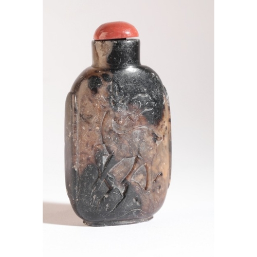 67 - A CHINESE SOAPSTONE SNUFF BOTTLE

19th century, one side carved with a stag in a rocky landscape, th... 