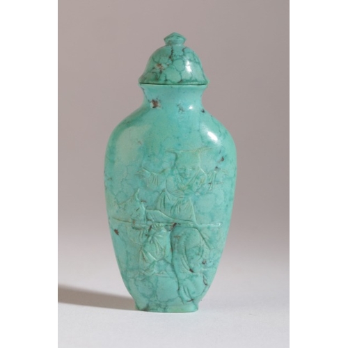 68 - A CHINESE TURQUOISE SNUFF BOTTLE

19th century, of small proportion and flattened form with two mask... 