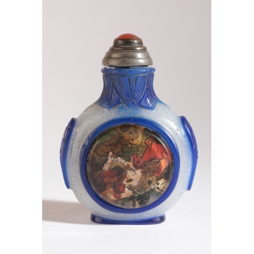 73 - A CHINESE GLASS SNUFF BOTTLE

probably 19th century, the snowflake ground with dark blue overlay, ci... 