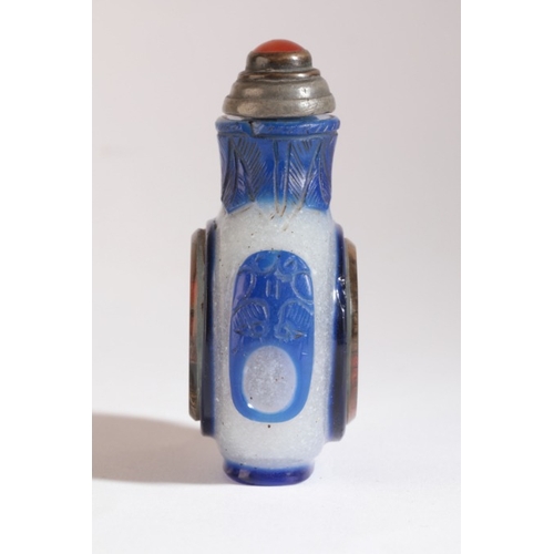 73 - A CHINESE GLASS SNUFF BOTTLE

probably 19th century, the snowflake ground with dark blue overlay, ci... 