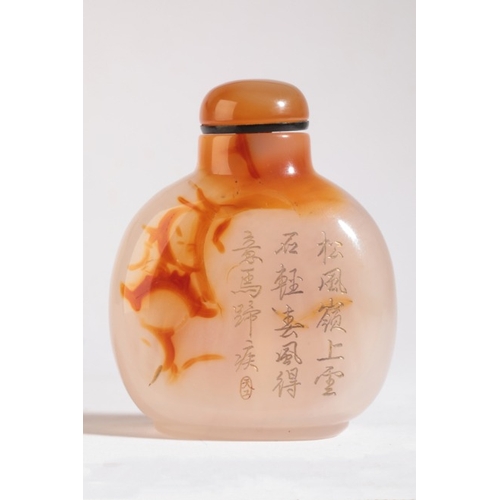 76 - A CHINESE AGATE SNUFF BOTTLE

19th century, of circular form with a horse under a pine tree carved t... 