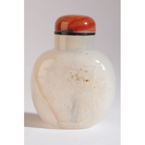 85 - A CHINESE AGATE SNUFF BOTTLE

19th century, carved to the front with two men, one harvesting, the re... 