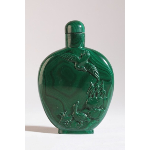 93 - A CHINESE MALACHITE SNUFF BOTTLE

19th/20th century, carved with geese and a crane in a rocky landsc... 