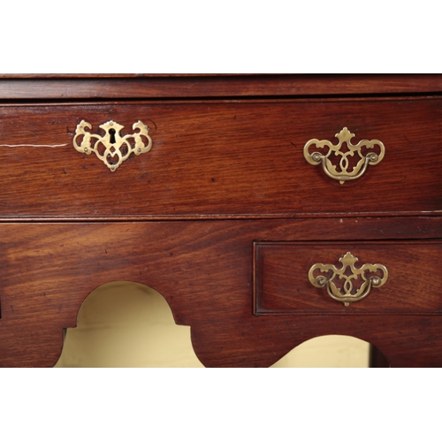 395a - A GEORGE II RED WALNUT LOWBOY with one long and two short drawers over the shaped apron, on cabriole... 