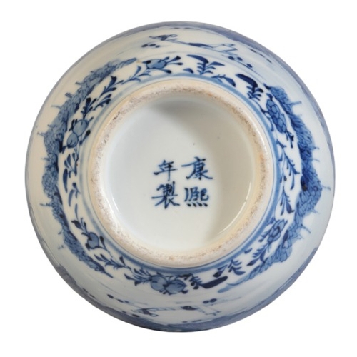 200 - A CHINESE PORCELAIN BLUE AND WHITE DOUBLE GOURD VASE

bearing a four character Kangxi mark to the ba... 