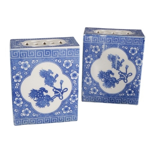 203 - A GROUP OF FOUR CHINESE PORCELAIN BLUE AND WHITE FLOWER BRICKS

20th century, of rectangular section... 