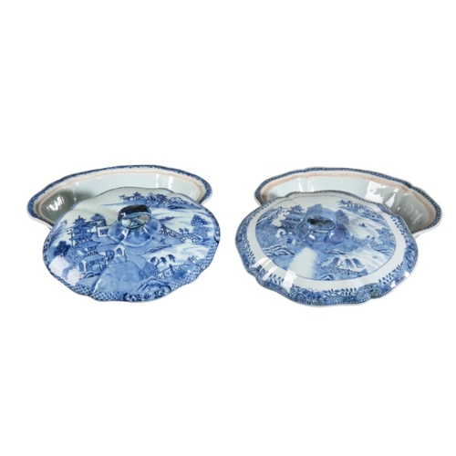 219 - TWO SIMILAR CHINESE EXPORT PORCELAIN BLUE AND WHITE TUREENS

19th century, both of shaped form decor... 